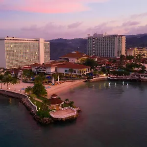 https://sunset-jamaica-grande-resort-spa.comcaribbean.com